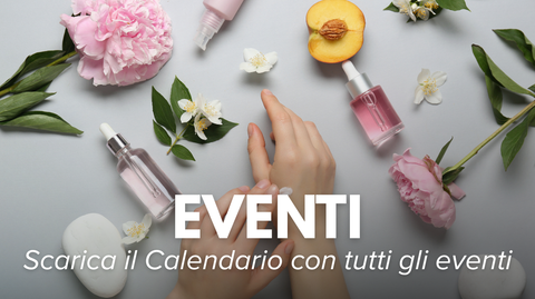 still life mani prodotti cosmesi e fiori pesca e sasso natural beauty